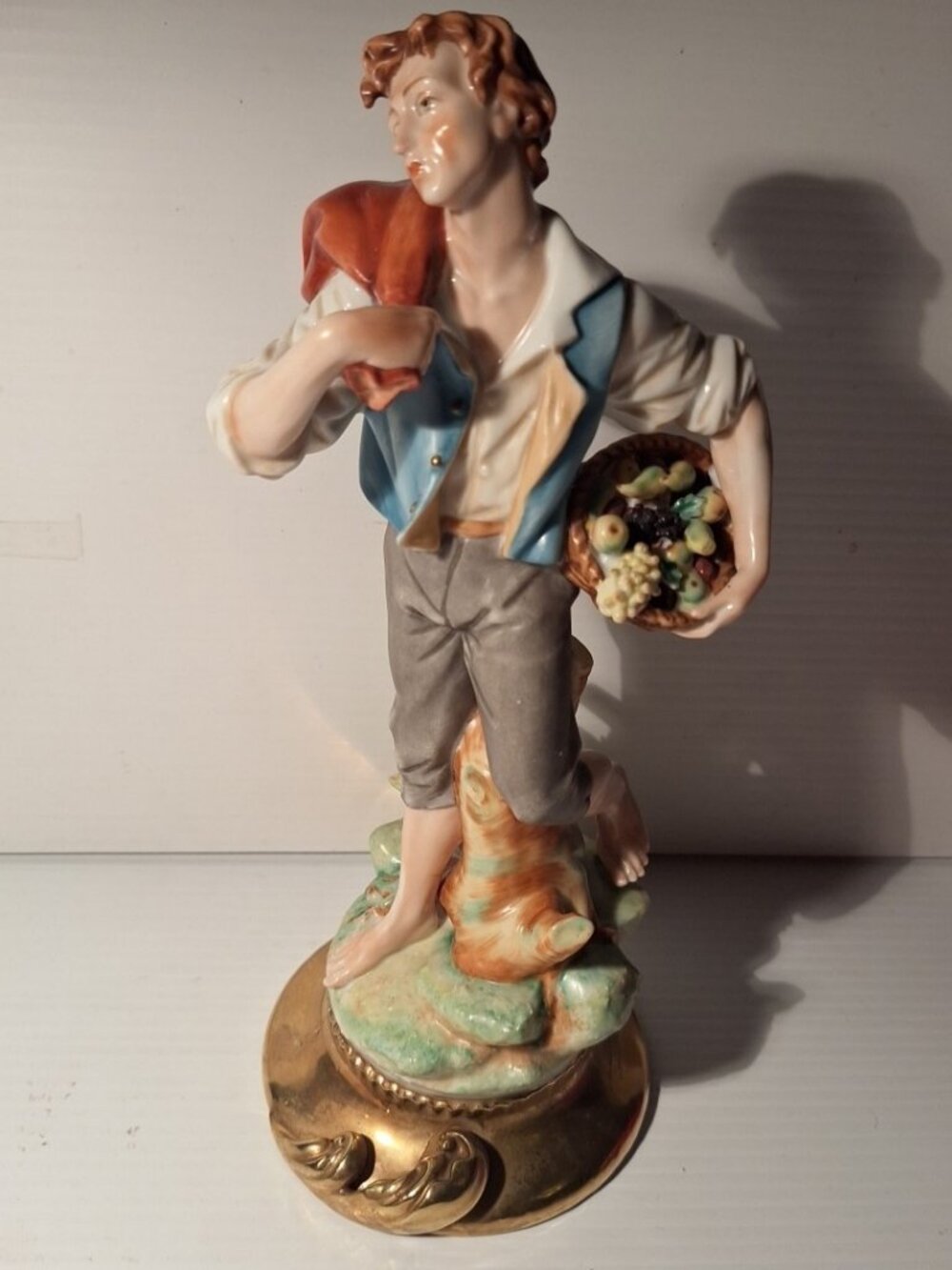 Vintage Porcelain "Andrea By Sadek" Young man with Fruit Basket/bag